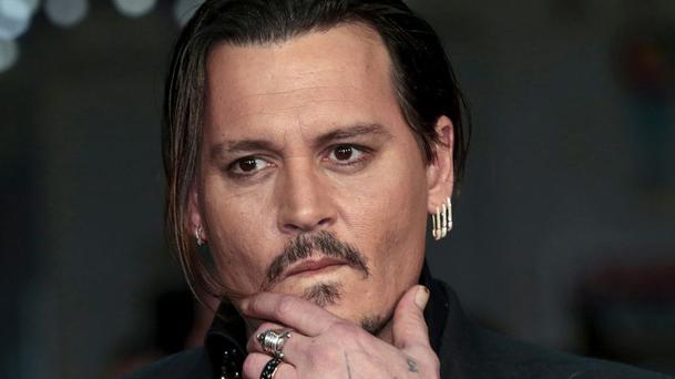 Johnny Depp enquête sur les meurtres de Tupac et Notorious B.I.G.